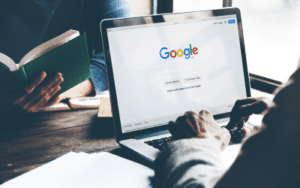 Person Typing into a Search Engine.